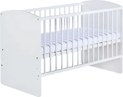 A white baby crib with a mattress inside, shown from a side angle against a white background.