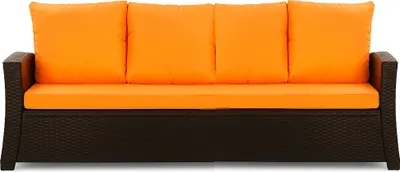 A front view of a brown rattan sofa with orange cushions.