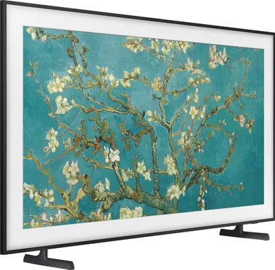 A television displaying a painting of a flowering tree.