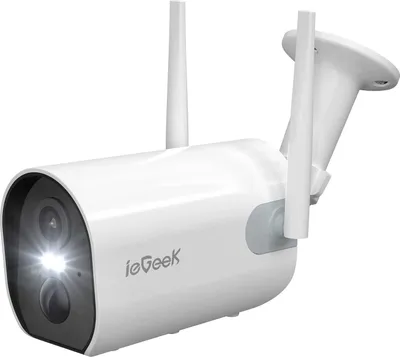 A white outdoor security camera with two antennas and a bright LED light on the front.