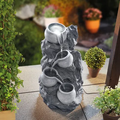 Produktbild von esotec Solar Fels-Kaskadenbrunnen granitfarben mit Akku und LED Licht 101322