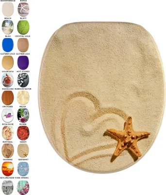 A toilet seat with a sandy beach design, featuring a starfish and a heart drawn in the sand.
