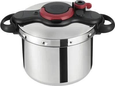 A stainless steel pressure cooker with black and red accents is shown against a white background.