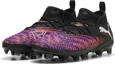 A pair of black and purple Puma soccer cleats.