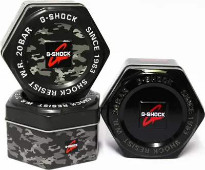 Three hexagonal G-Shock watch boxes are stacked and arranged.