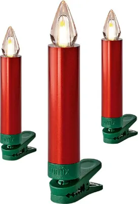 Three red clip-on LED candles with clear flame-shaped tops are arranged diagonally against a white background.