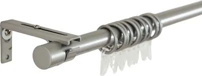 A close-up view of a curtain rod set against a white background.