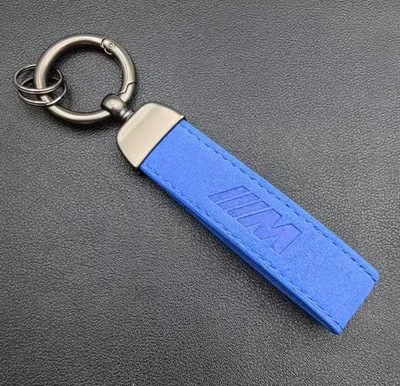 Produktbild von Alcantara Schlüsselanhänger für BMW M Blau – Premium Schlüsselanhänger mit Alcantara Optik, blauen Akzenten und Metallring