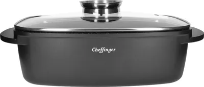 A black rectangular baking dish with a glass lid and silver handles, set against a white background.