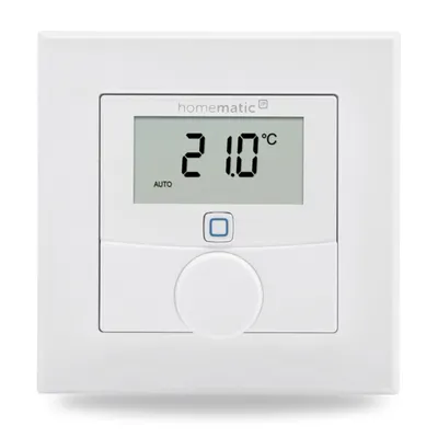 A white wall thermostat with a digital display showing the temperature and mode.
