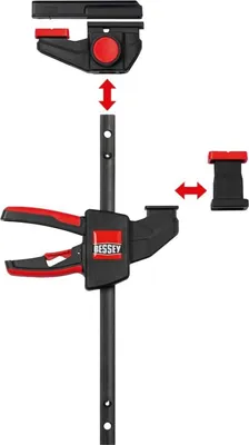 A disassembled clamp with its parts shown separately.