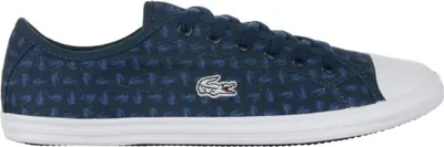 A side view of a blue Lacoste sneaker with a repeating pattern of small Lacoste logos.