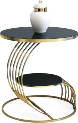 Produktbild von Designer-Tisch mit runder Tischplatte und geschwungenem goldenen Gestell