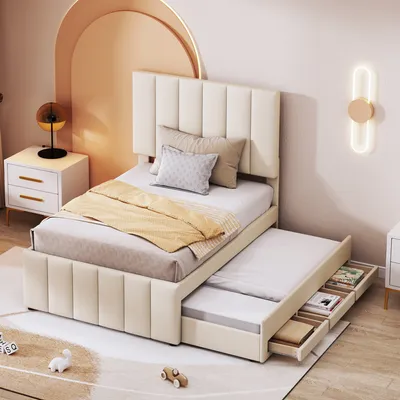 A beige upholstered bed with a pull-out trundle and storage drawers, set in a modern bedroom with a decorative arch and a bedside table.