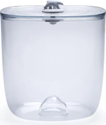 A clear, transparent storage container with a lid featuring a polar bear figurine.