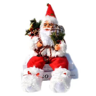 A decorative Santa Claus figurine sitting on books.