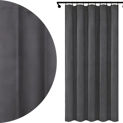 A close-up view of a dark gray curtain hanging from a rod, with a magnified section showing fabric texture.