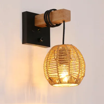 Produktbild von Mckalen Rattan Wandlampe Innen Vintage, Retro Wandlampe E27, Lampenschirm für Wohnzimmer Schlafzimmer Flur Esszimmer, Max 60W – Braun, Metallisch