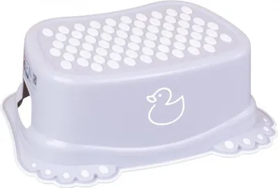 A grey plastic step stool with white dots and a duck illustration on it.