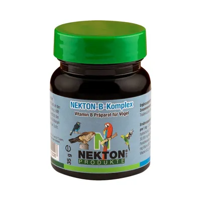 A product shot of a small jar of bird vitamins with a green lid.