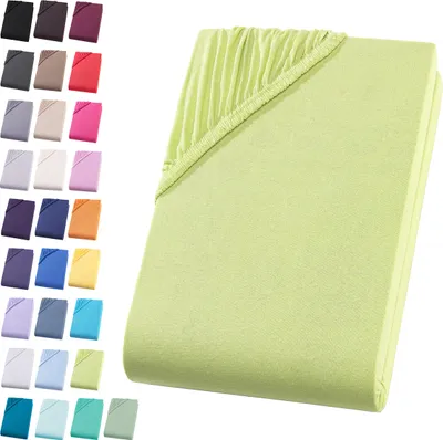 A folded fitted sheet is shown, with a swatch of other colors displayed to the left.