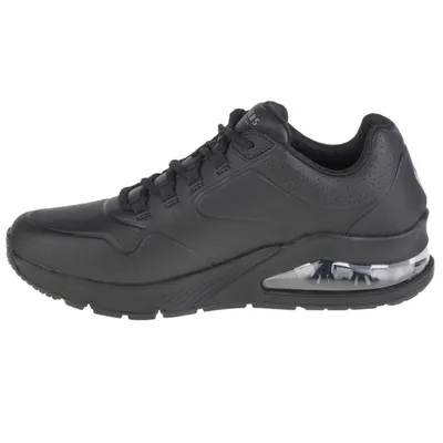 A side view of a black Skechers sneaker with a clear air bubble in the sole.