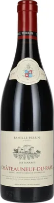 A bottle of red wine against a white background.