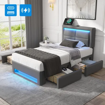 A modern gray bed with LED lighting and storage drawers.