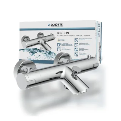 A chrome bathtub faucet with its packaging in the background.