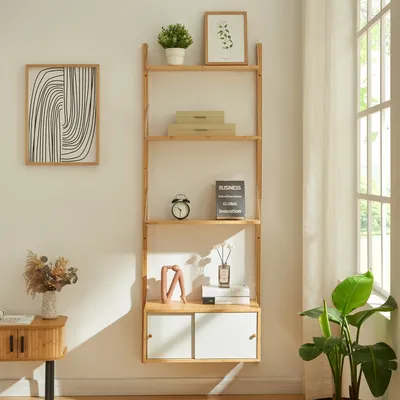 A wooden ladder shelf with decorative items and storage compartments, placed against a white wall next to a window.