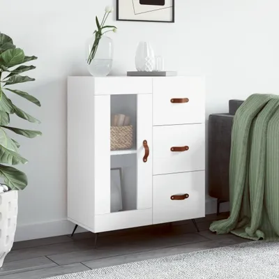 A white sideboard with a glass door and drawers, decorated with a plant and vases, in a room setting.