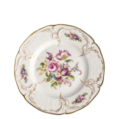 A single plate with floral decoration on a white background.