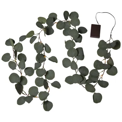 A string of artificial eucalyptus leaves with small LED lights and a battery pack.