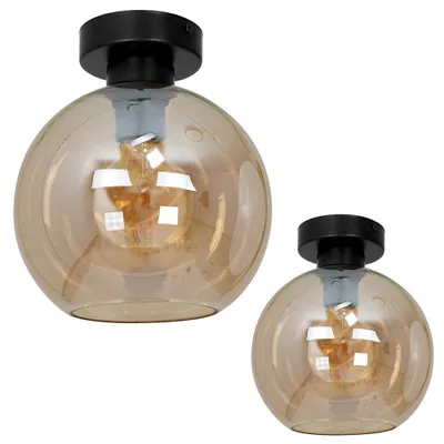 Two amber glass ceiling lights with black bases are shown against a white background.
