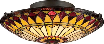 A Tiffany-style flush mount ceiling light with a stained glass shade.