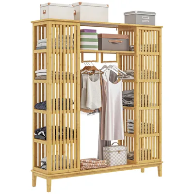 A wooden wardrobe filled with clothes and storage boxes.