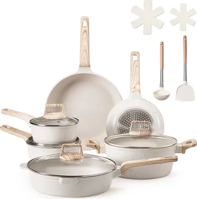A collection of white cookware with wood-effect handles, including pots, pans, a ladle, and a spatula, arranged on a white background.