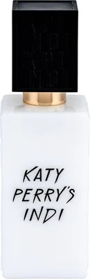 A perfume bottle with a black cap and white body, featuring the brand name in black text.