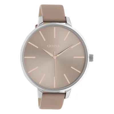 A close-up studio shot of a women's wristwatch.