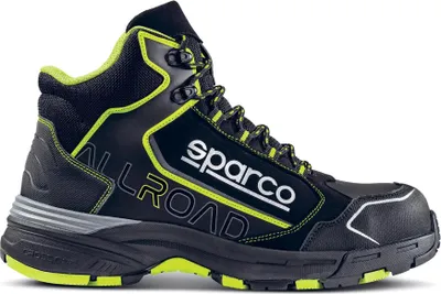A single black and neon green work boot is shown against a white background.