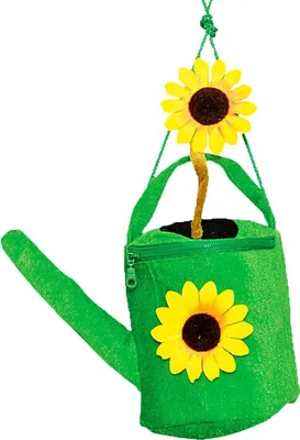 A green watering can shaped handbag with a sunflower decoration, hanging from a string.