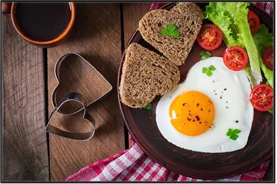 Produktbild von Wallario Wandbild Frühstück mit Liebe serviert, Größe: 61 x 91,50 cm, Poster mit schwarzem Aluminiumrahmen