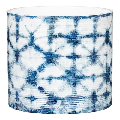A cylindrical ceramic planter with a blue and white tie-dye pattern.