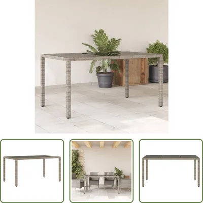 Obrázek produktu pro The Living Store Zahradní stůl se skleněnou deskou šedý 150x90x75 cm z polyratanu
