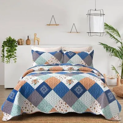 Produktbild von Gewatteerte Blauw Patchwork Bedsprei 220x240 mit 2 Kussenslopen 50x75