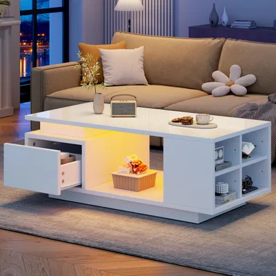 Image de OKWISH Table Basse Finition Brillante - avec Éclairage LED Intégré et Tiroir, Rangement Latéral Design Ajouré, 100x50x36 cm, Blanc