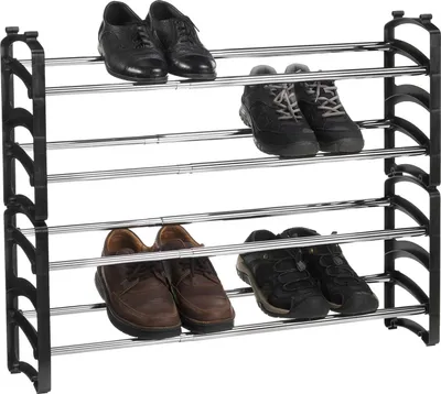 A multi-tiered shoe rack holding various types of shoes.