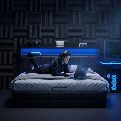 Zdjęcie produktu dla Łóżko podwójne ProximaX 140 x 200 cm, czarne PU, schowek z napędem hydraulicznym, oświetlenie LED RGB, stacja ładująca zgodna z normami UE