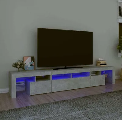 A modern TV stand with integrated LED lights and a large flat-screen TV on top.