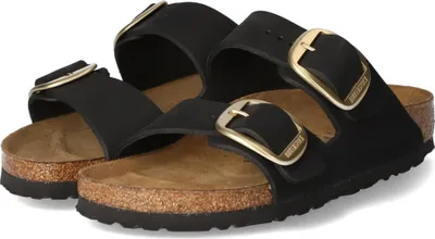 A pair of black Birkenstock Arizona Big Buckle sandals with gold buckles.